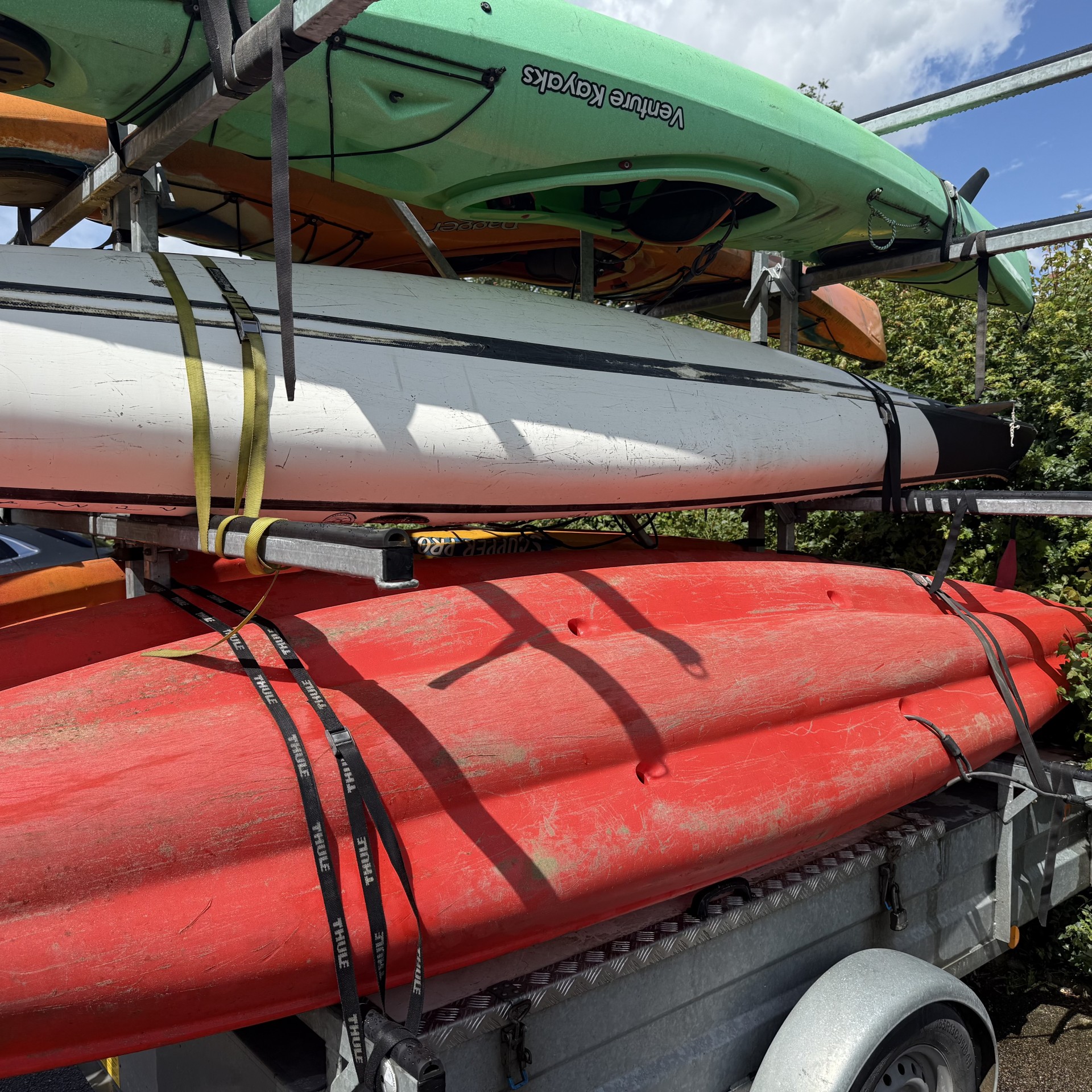 Carry tourers, sea kayaks, sit-on-top kayaks and canoes securely with the Motiv braked kayak canoe trailer for Sale.