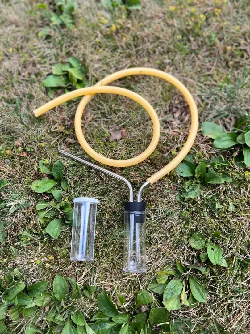 Aspirator (poster) used for collecting very small insect specimens in Suffolk with NOMAD Outdoor Learning.