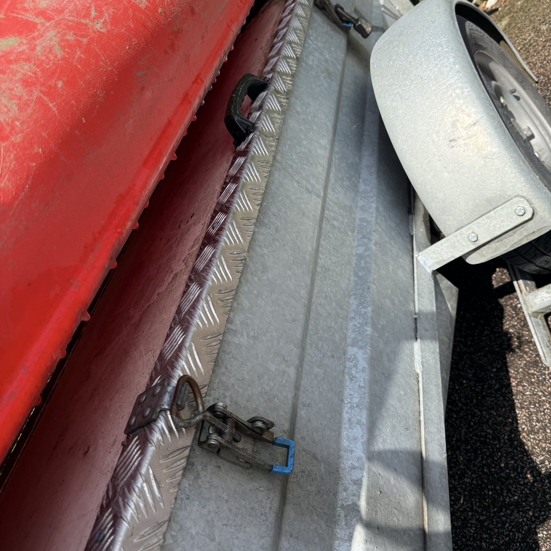Three large lockable equipment boxes on the Motiv braked kayak canoe trailer for Sale.